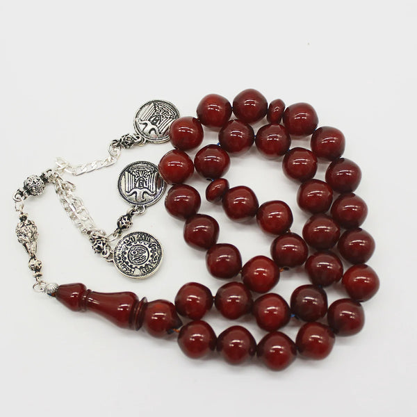 Aged Turkish musk rosary in wavy peach color, medium size bead, woven with double propylene thread for greater durability and with a cork from a mixture of antimony and metal.