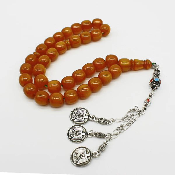 Aged Turkish musk rosary in wavy honey color, medium size bead, woven with double propylene thread for greater durability and with a crochet made of a mixture of antimony and metal.