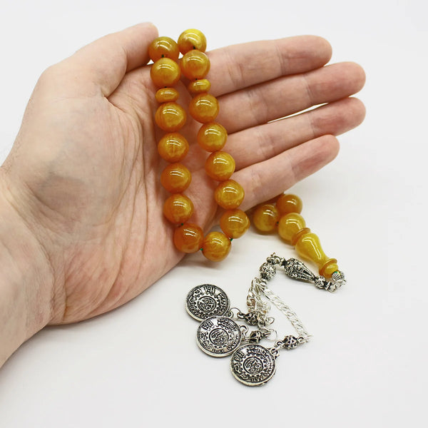 Aged Turkish musk rosary in light honey wavy bead size, medium size, woven with double propylene thread for greater durability and with a corkouche made of a mixture of antimony and metal.