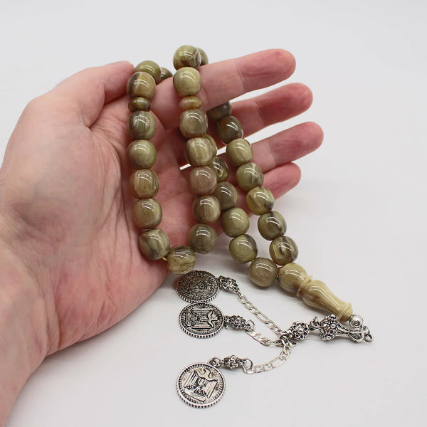 Aged Turkish musk rosary in corrugated mold, the size of a medium bead, woven with double propylene thread for greater durability and with a corkouche made of a mixture of antimony and metal.