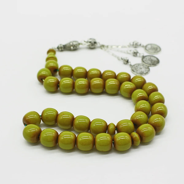 Aged Turkish musk rosary in olive green, medium bead size, woven with double propylene thread for greater durability and with a carcocha made of a mixture of antimony and metal.