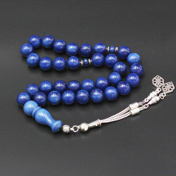 Musky molasses and rashi rosary in distinctive blue color, medium bead, woven with strong fluorocarbon thread and with a crochet made of a mixture of antimony and metal.