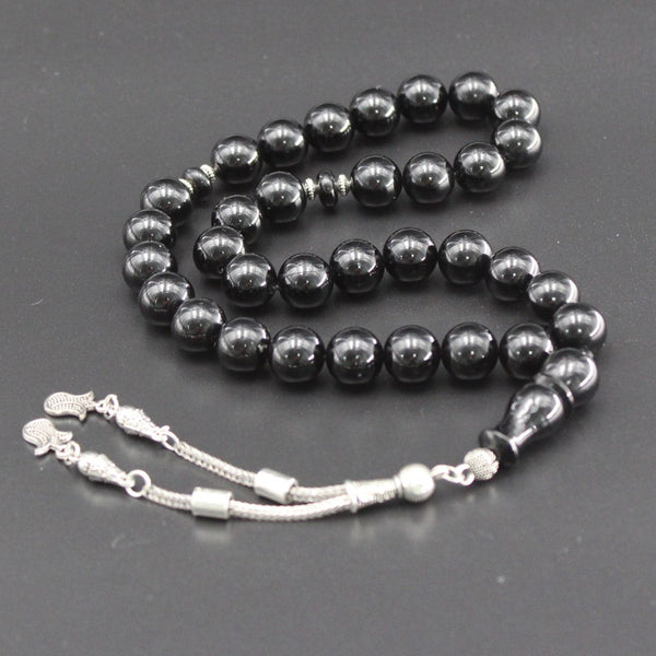 Sandalous musky rosary in an attractive black color, a medium bead woven with a strong fluorocarbon thread and a crochet made of a mixture of antimony and metal.