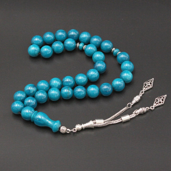 Muski molasses and rashi rosary in distinctive turquoise blue color, medium bead, woven with strong fluorocarbon thread and with a crochet of antimony and metal mixture.