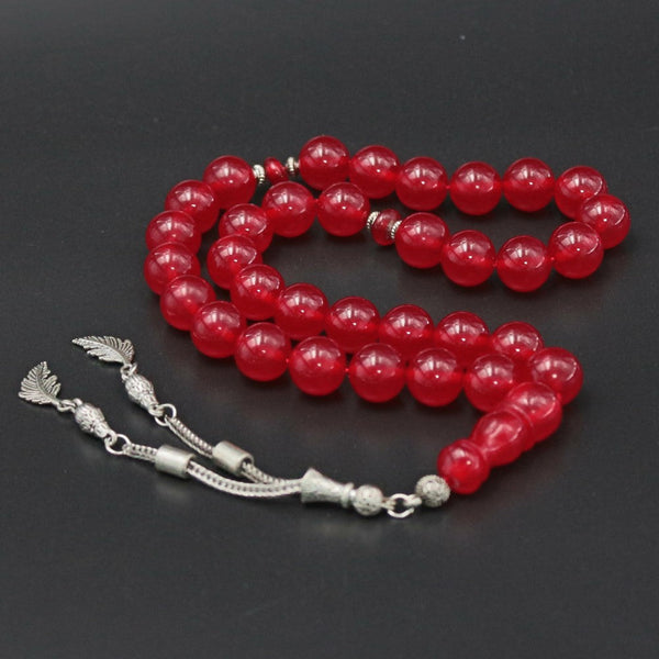 Turkish faturan rosary in beautiful cherry red color, medium bead, woven with strong fluorocarbon thread and with a tassel made of a mixture of antimony and metal.