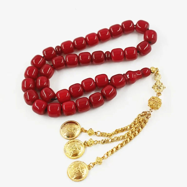 Antique Turkish faturan rosary in a beautiful cherry red color, the size of a coarse bead, woven with durable propylene thread and with a tassel made of a mixture of golden antimony and metal.