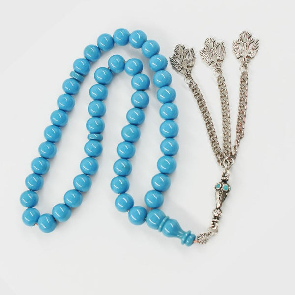 Aged musky sandalous rosary in an attractive sky blue color, a soft bead woven with durable propylene thread and a crochet made of a mixture of antimony and metal.